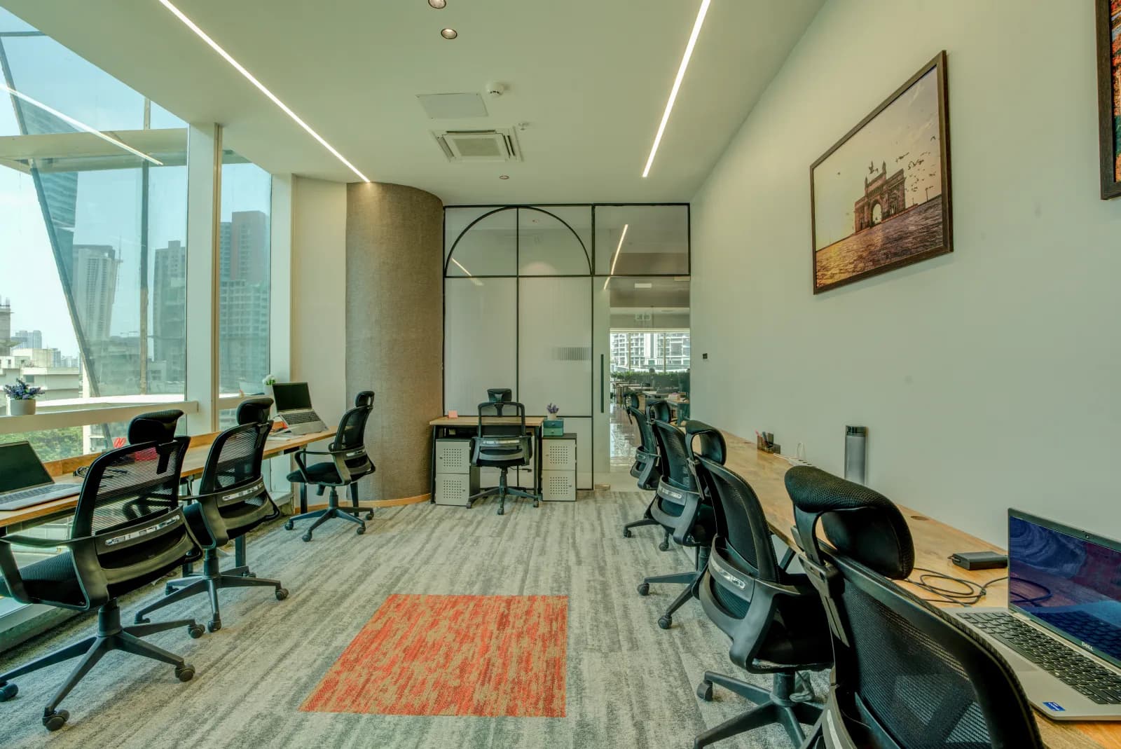 Dedicated desks by the window on a 603 floor
